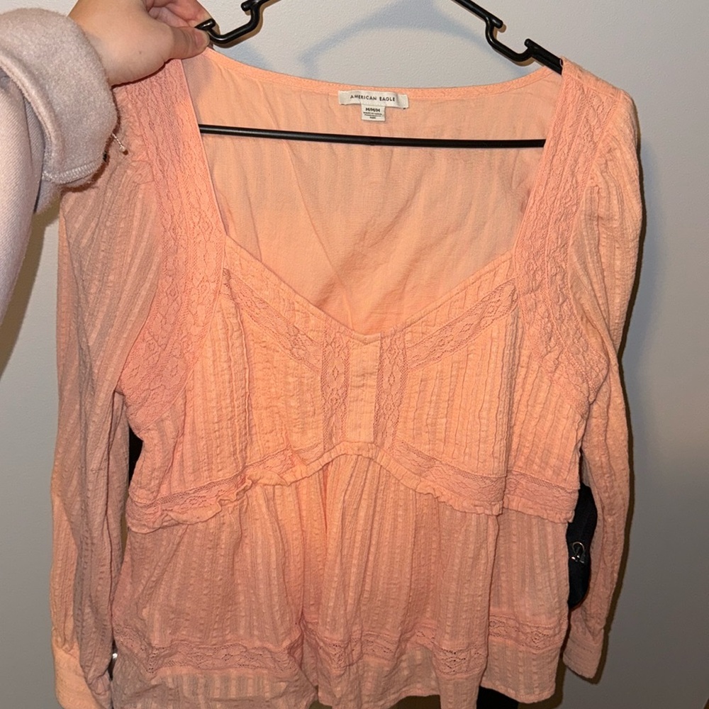 American Eagle - size Medium peach/pink color.